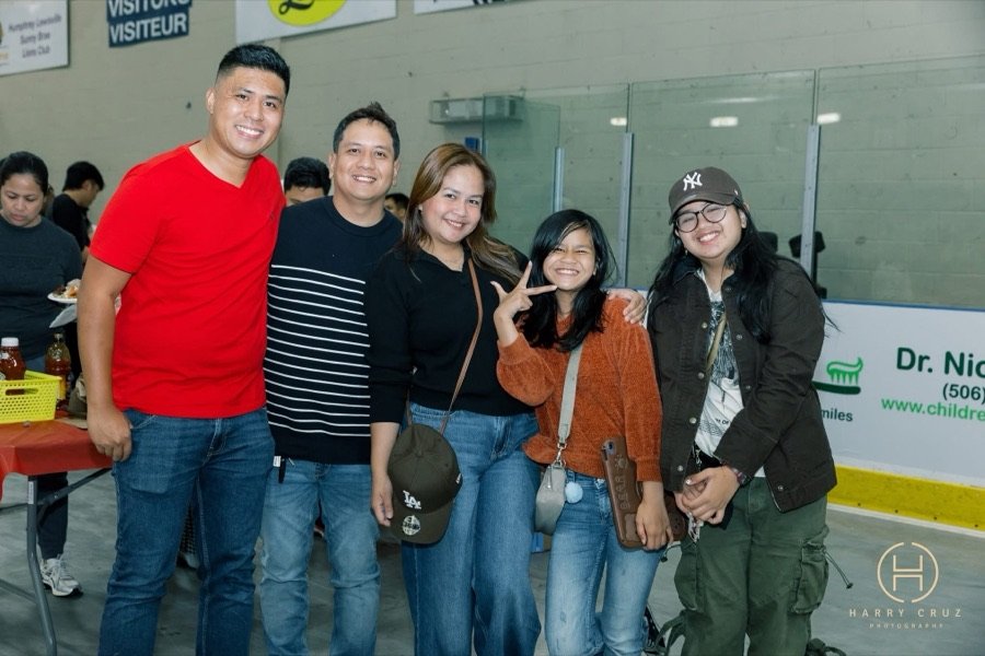 A group of guests smiling together