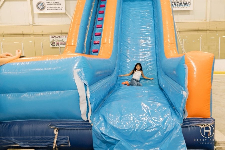 Child enjoying the inflatable slide